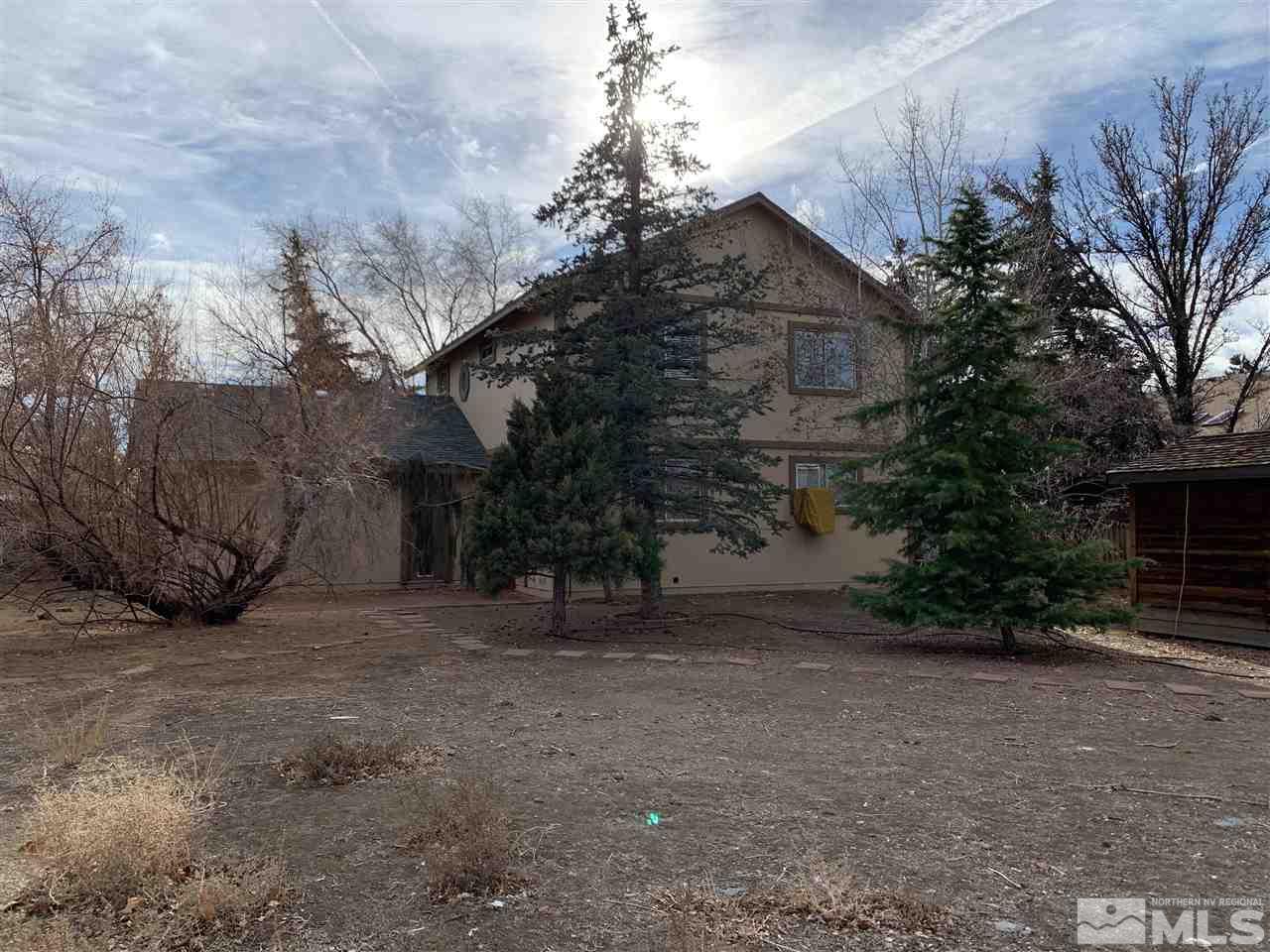 100 Silverstone Place Reno, NV 89512 - Photo 17 of 17 a view of a house with a trees