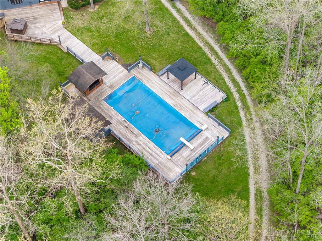 6750 Little Twin Road Germantown, OH 45327 - Photo 77 of 88 This property features a refreshing private pool, surrounded by expansive decking for outdoor enjoyment.