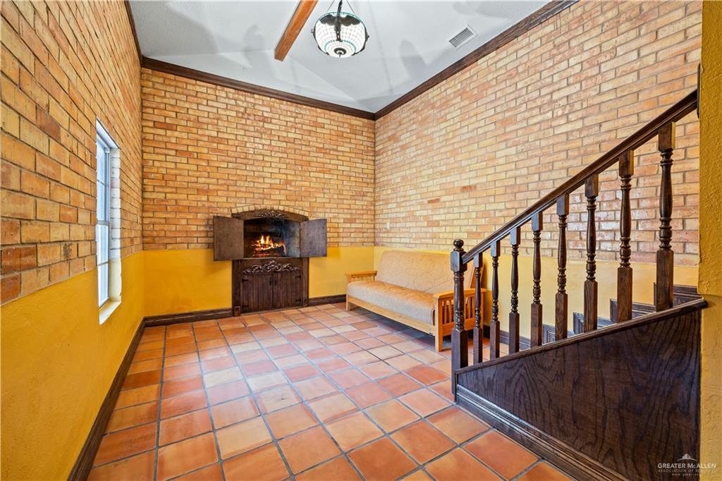 610 North Texas Street Rio Grande City, TX 78582 - Photo 12 of 23 BONUS ROOM WITH FIRE PLACE