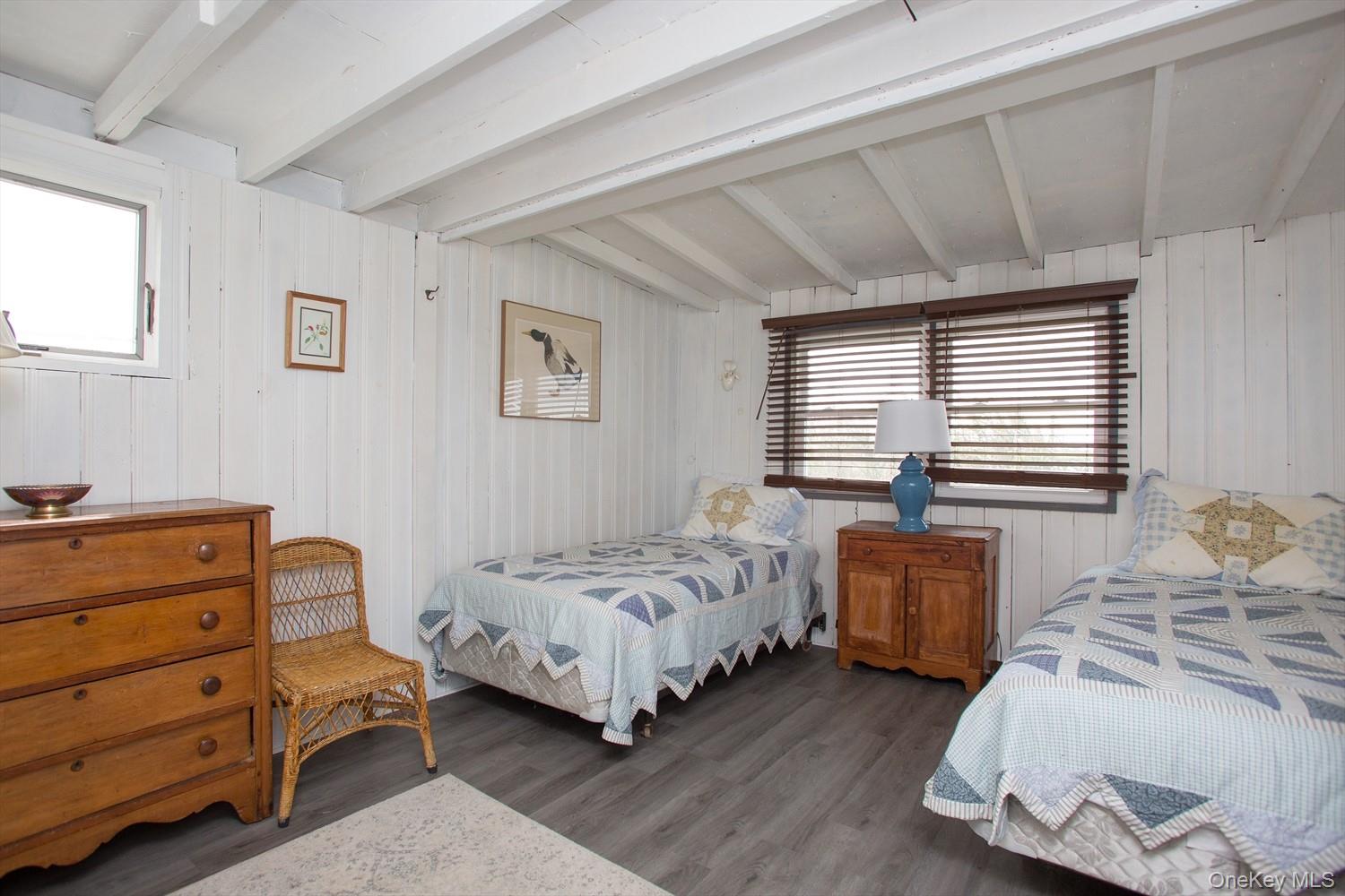39 Point Road Westhampton Beach, NY 11978 - Photo 11 of 15 a bedroom with a bed and a window