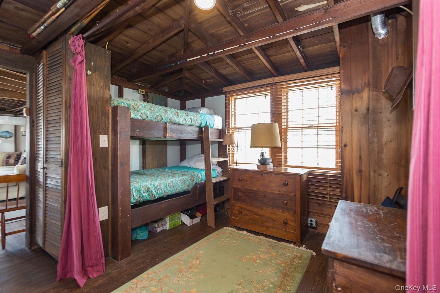 39 Point Road Westhampton Beach, NY 11978 - Photo 13 of 15 a room with furniture and a window