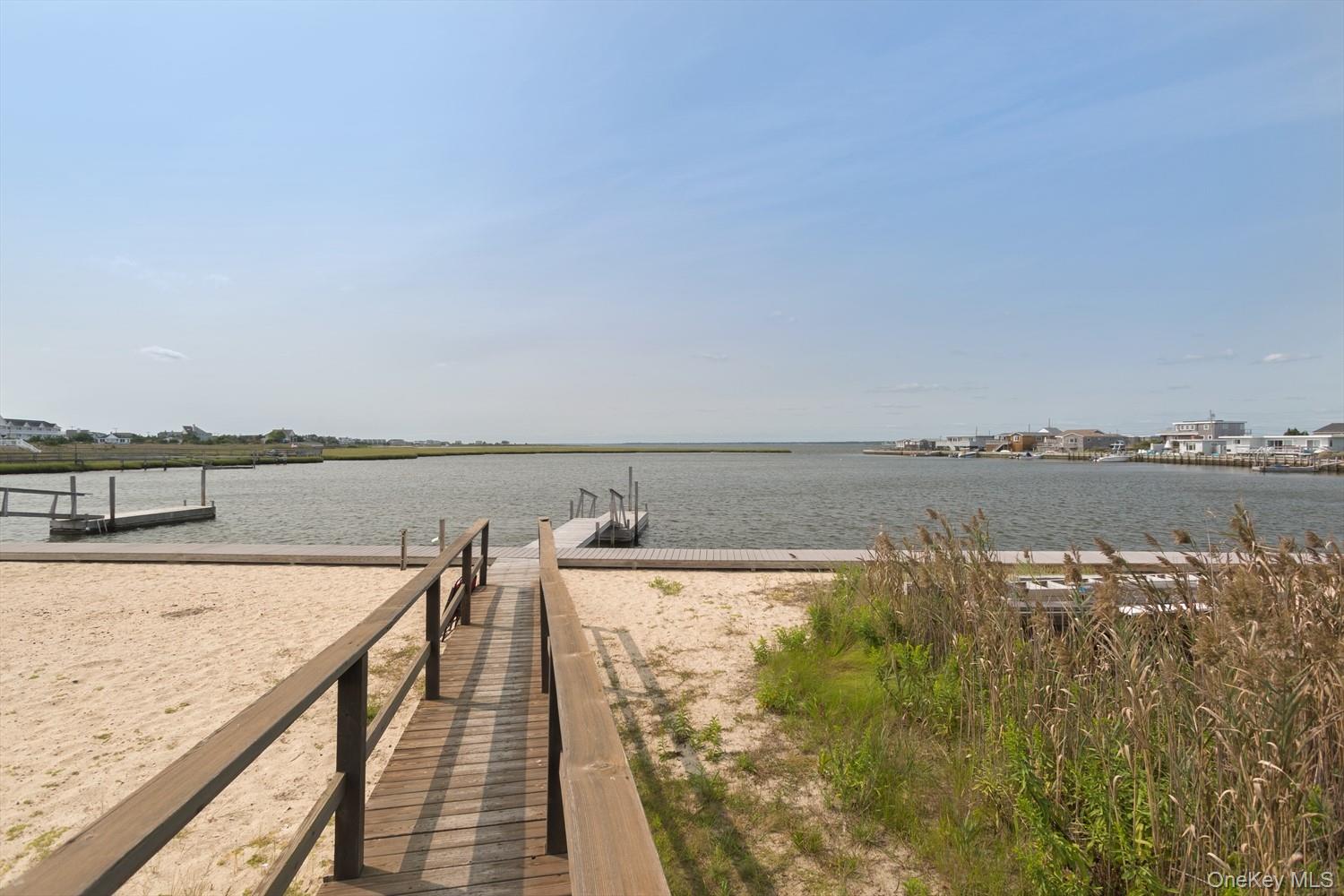 39 Point Road Westhampton Beach, NY 11978 - Photo 14 of 15 a view of ocean with a large bridge