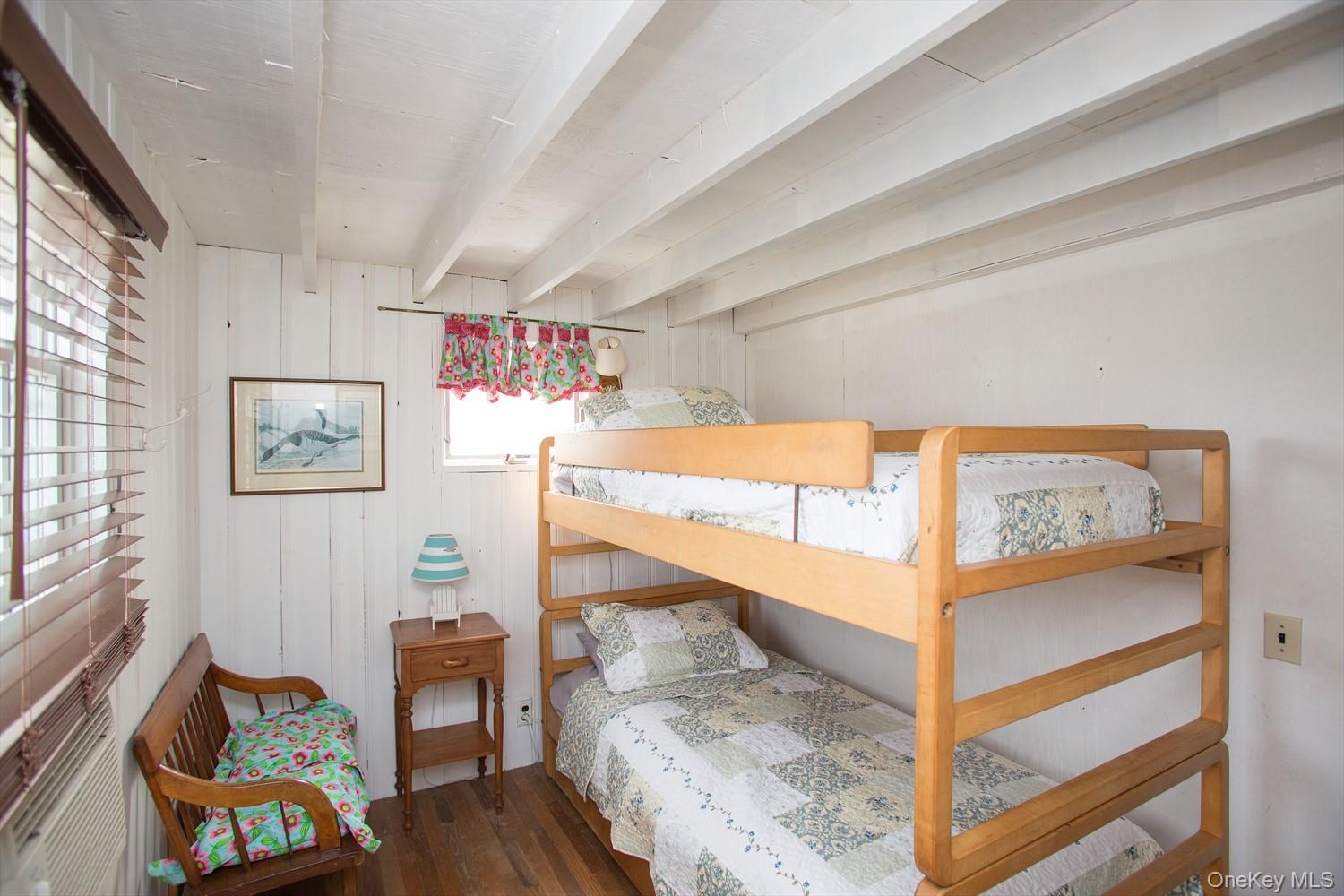 39 Point Road Westhampton Beach, NY 11978 - Photo 10 of 15 a bedroom with furniture and a baby crib