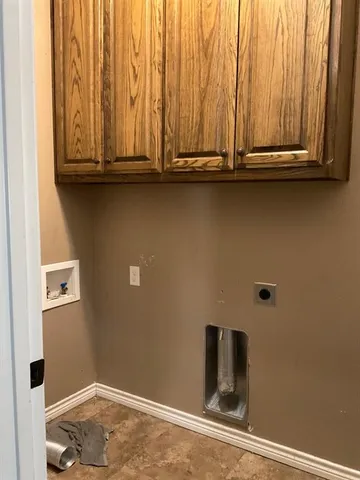 a view of room with racks on the wall