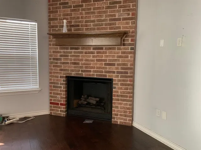 a living room with a fireplace