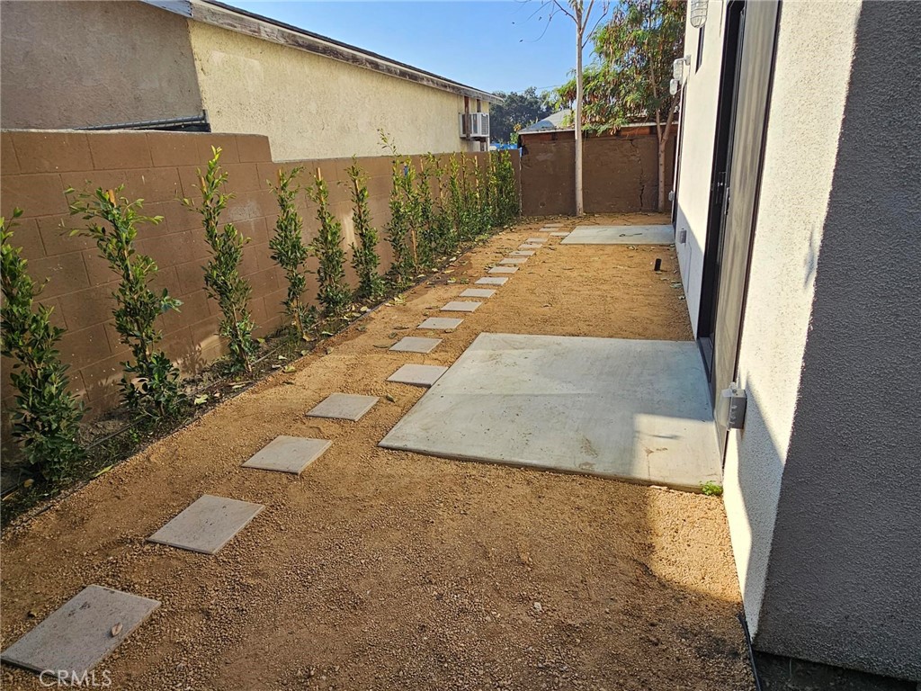 720 San Pascual Avenue Los Angeles, CA 90042 - Photo 19 of 20 a view of a back yard of the house