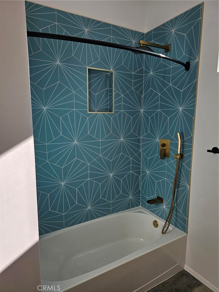 720 San Pascual Avenue Los Angeles, CA 90042 - Photo 8 of 20 a bathroom with a shower and a bathtub