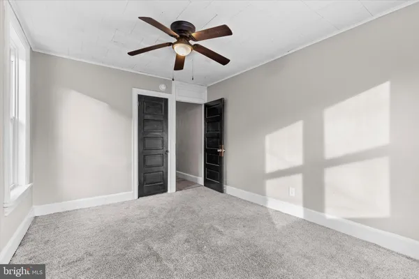 an empty room with windows