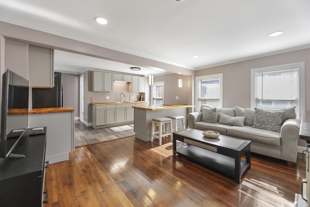45 Forest Street Lee, MA 01238 - Photo 19 of 42 a living room with furniture and a wooden floor