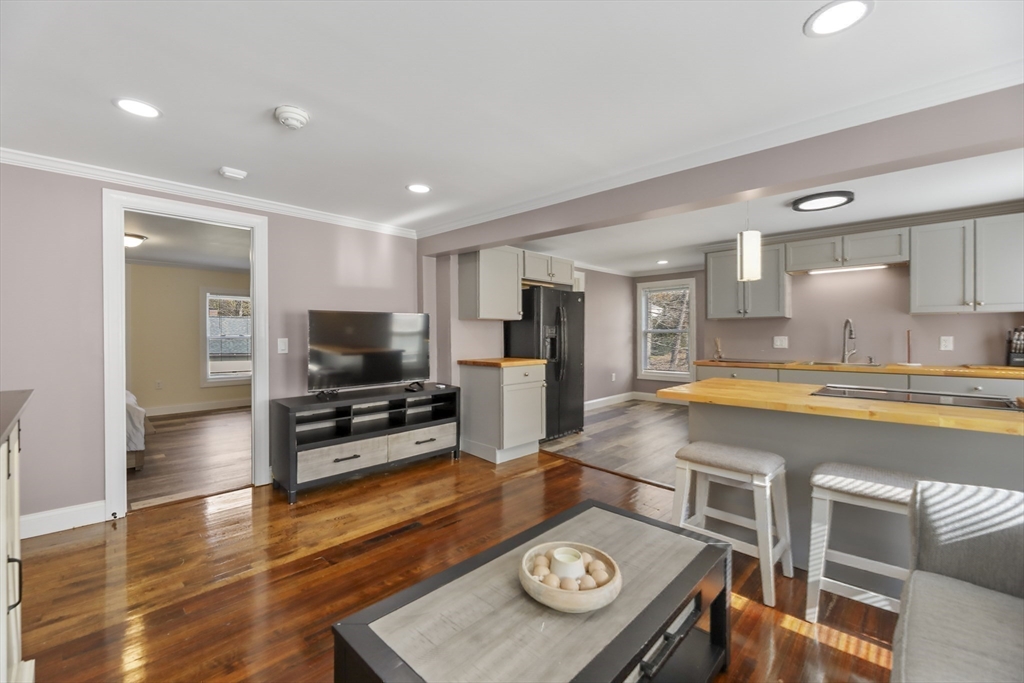 45 Forest Street Lee, MA 01238 - Photo 21 of 42 a kitchen with stainless steel appliances granite countertop a stove and a refrigerator