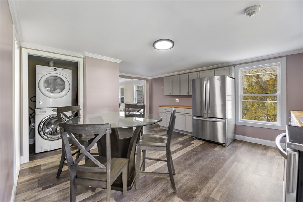 45 Forest Street Lee, MA 01238 - Photo 28 of 42 a view of a dining room with furniture window and wooden floor