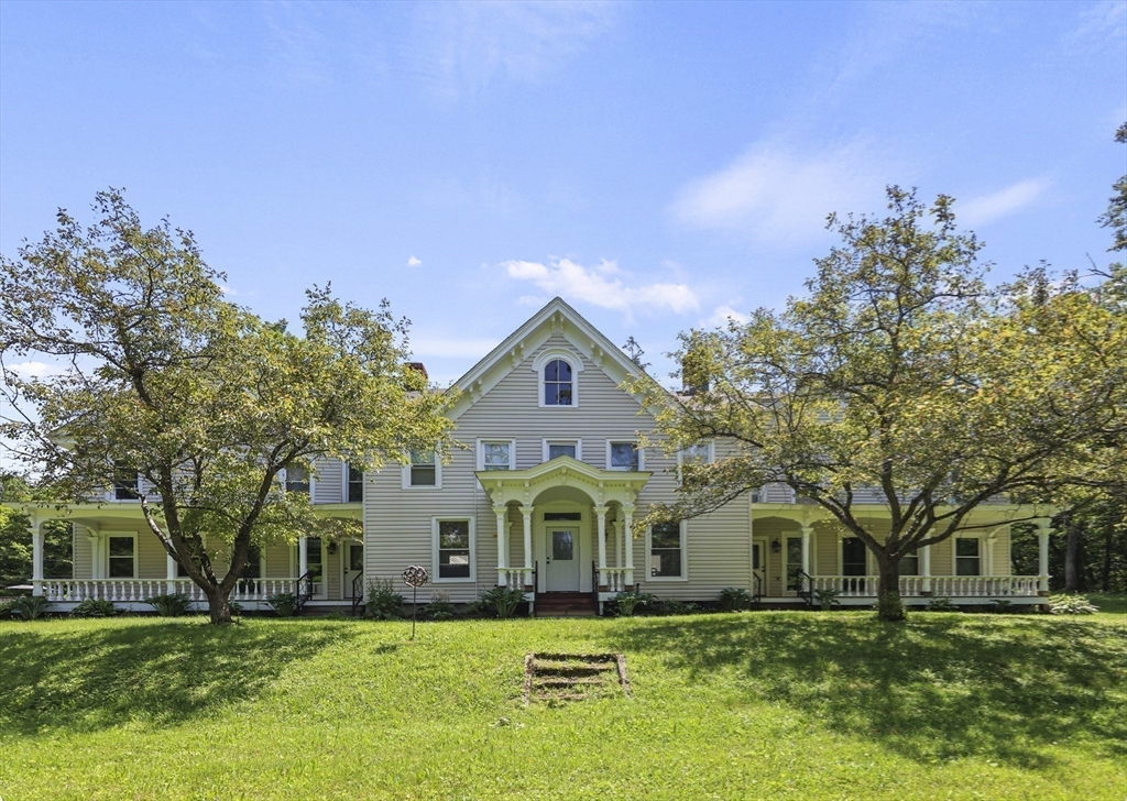 45 Forest Street Lee, MA 01238 - Photo 30 of 42 a front view of a house with a yard