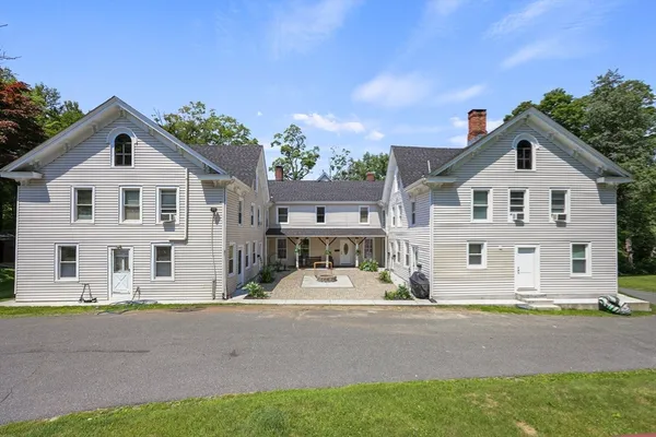 front view of a house with a street