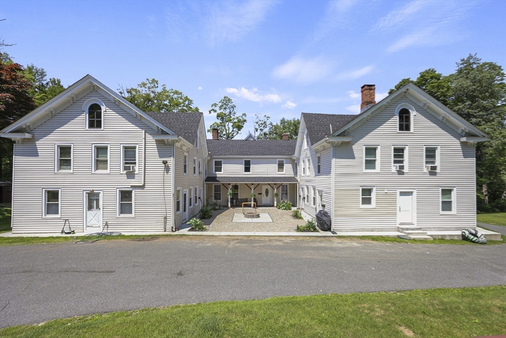 45 Forest Street Lee, MA 01238 - Photo 35 of 42 front view of a house with a street