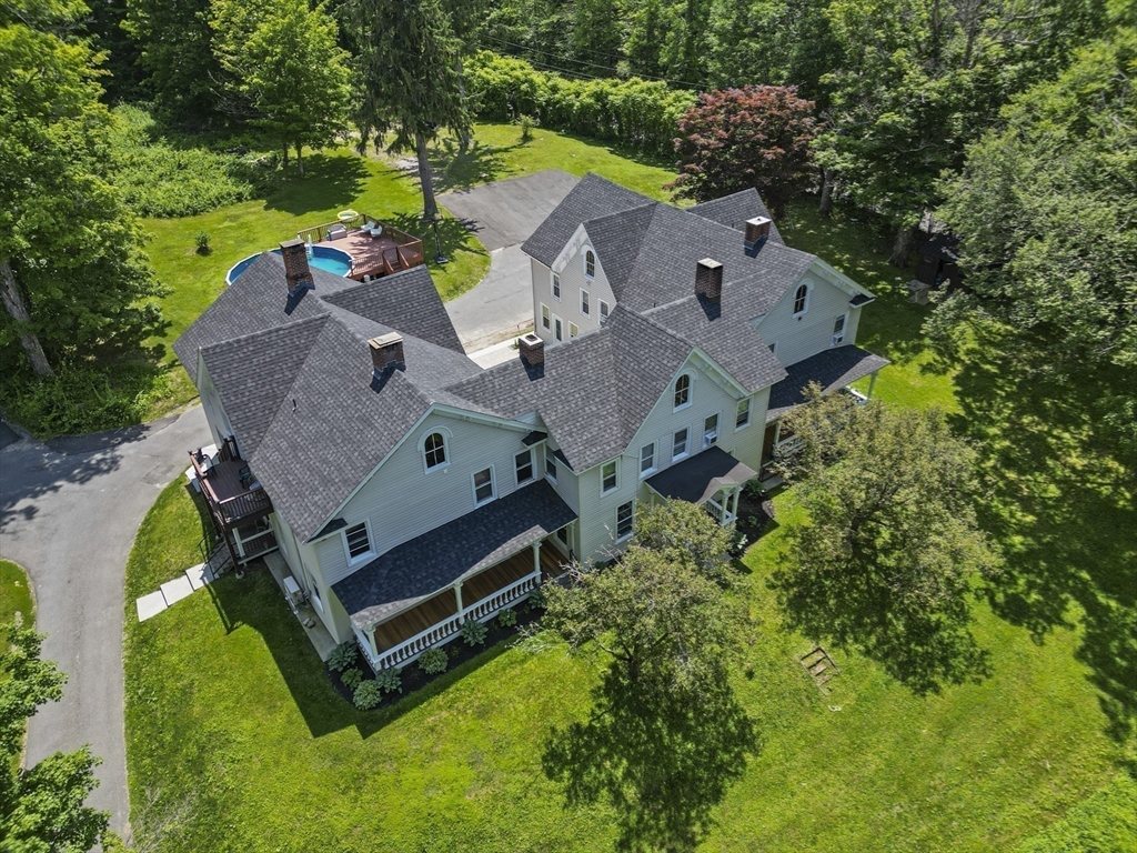 45 Forest Street Lee, MA 01238 - Photo 40 of 42 an aerial view of a house with swimming pool outdoor seating and yard
