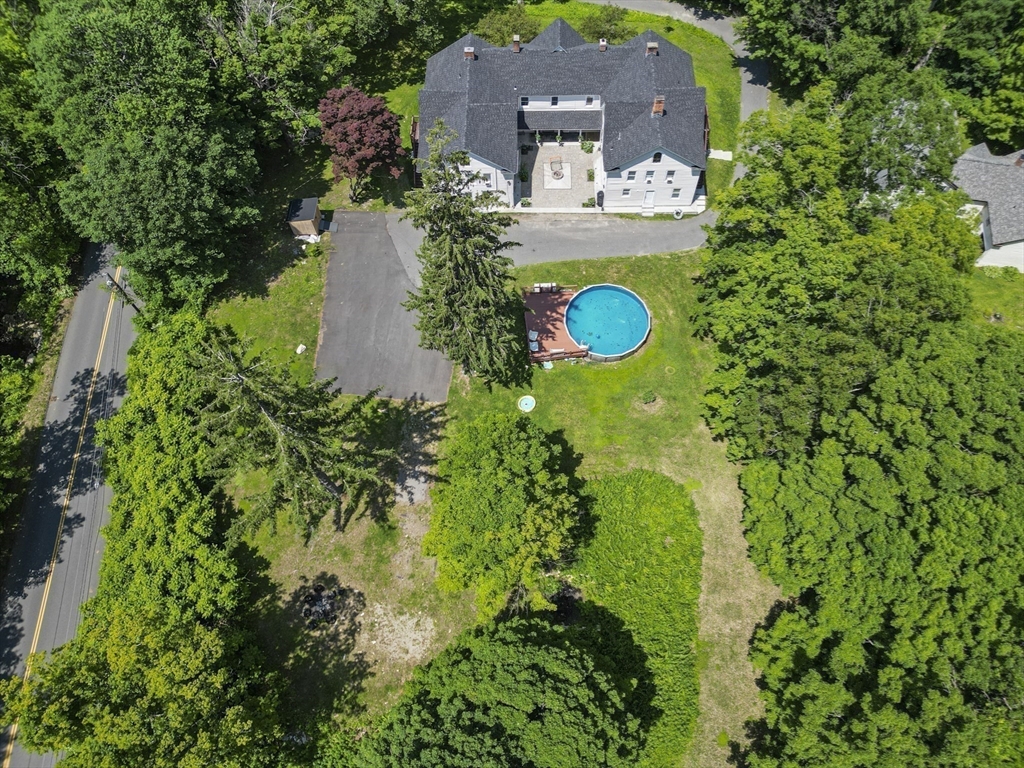 45 Forest Street Lee, MA 01238 - Photo 41 of 42 an aerial view of a house with a yard
