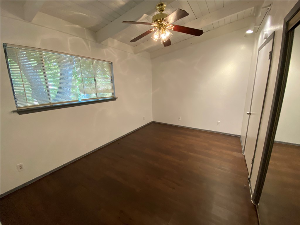 2413 Leon Street, Unit 102 Austin, TX 78705 - Photo 14 of 22 an empty room with windows and entrance