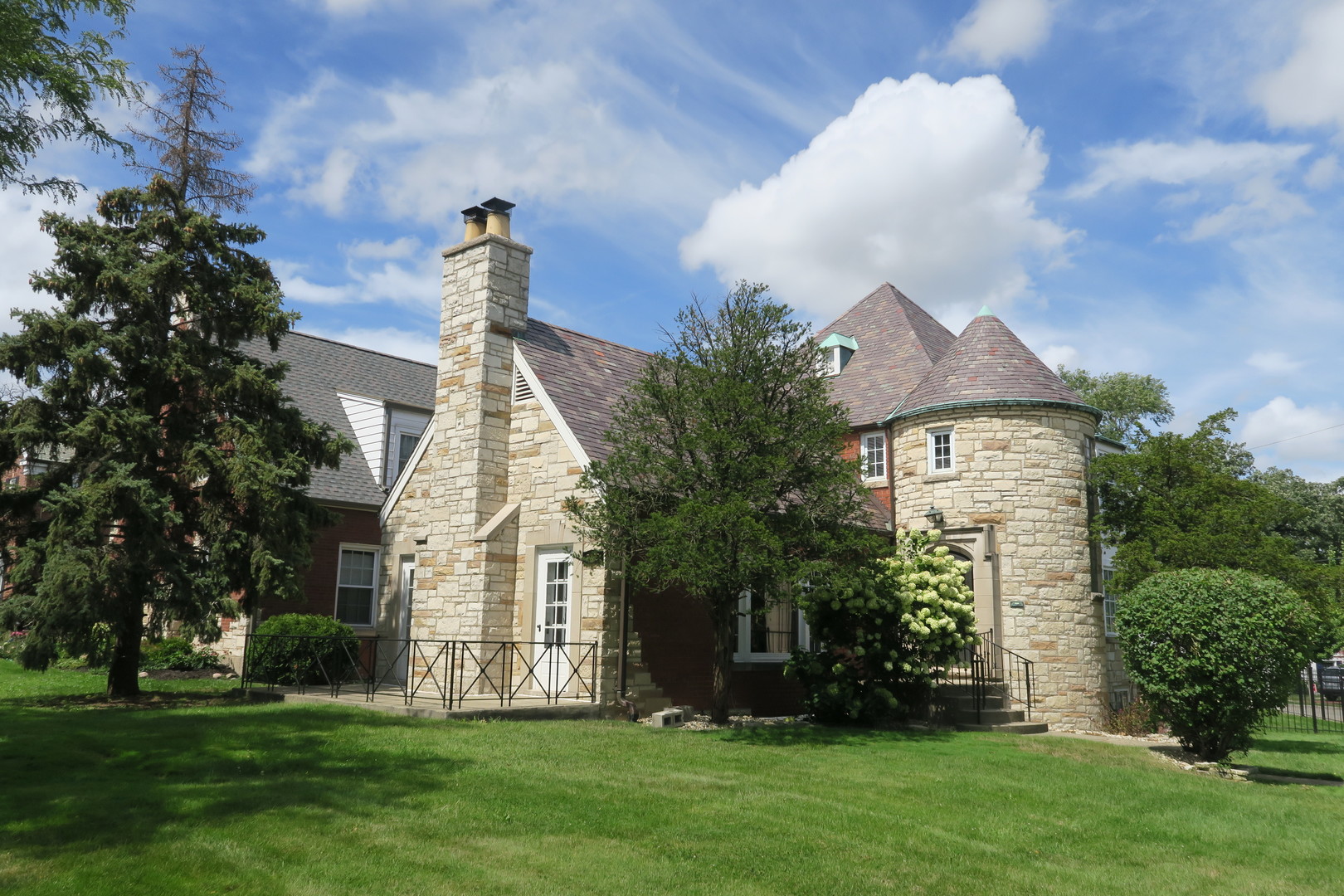 2000 West 103rd Street Chicago, IL 60643 - Photo 1 of 1 a front view of a house with a garden and plants