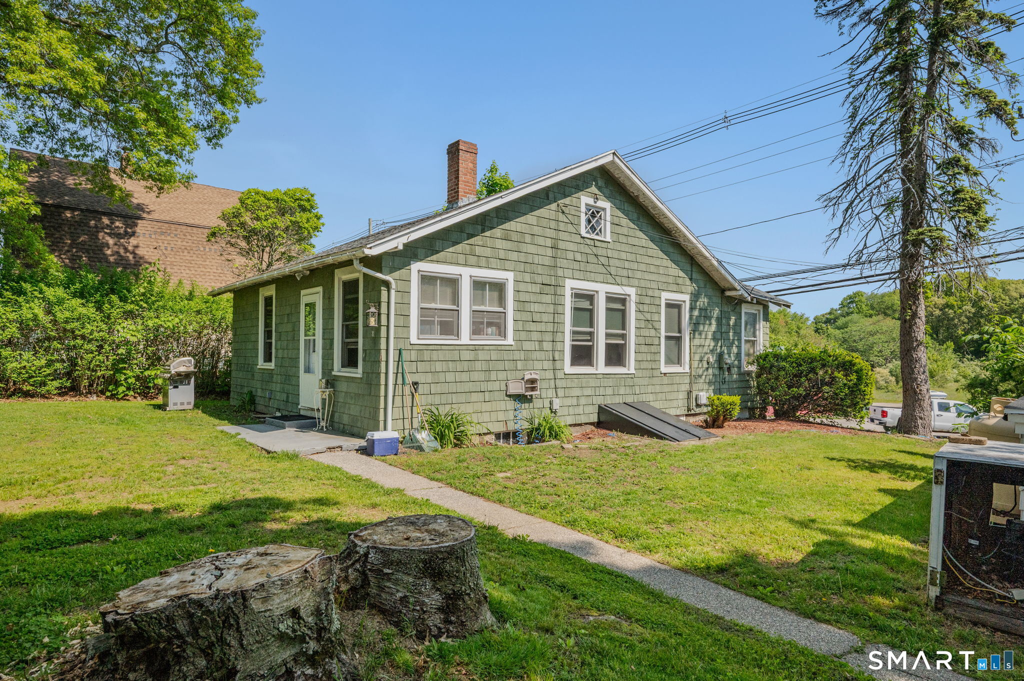 231 Poquonnock Road Groton, CT 06340 - Photo 3 of 30 a view of a house with a yard