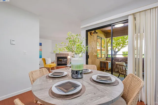a table and chairs sitting in a living room