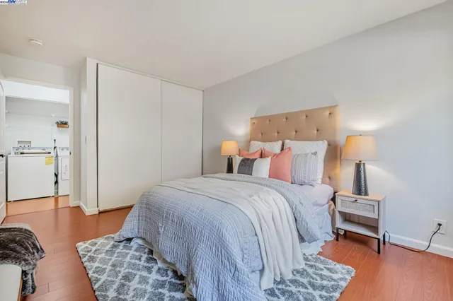 a bed room with a bed and a couch