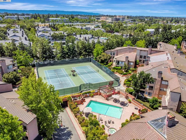an aerial view of a house with a garden