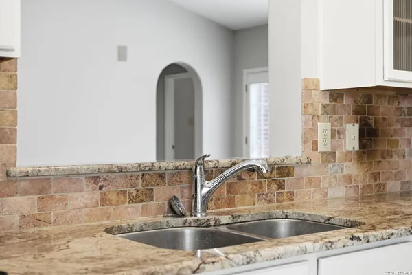 a view of a kitchen with an empty space