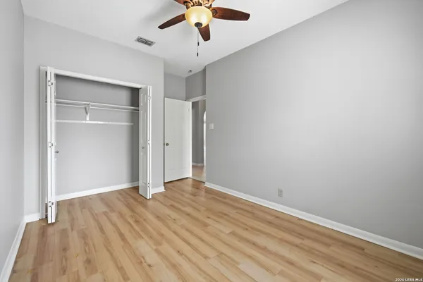 a view of an empty walk in closet