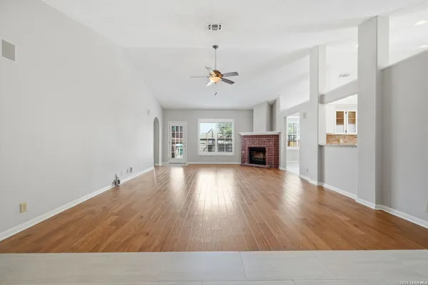 a view interior of a house wooden floor fire place
