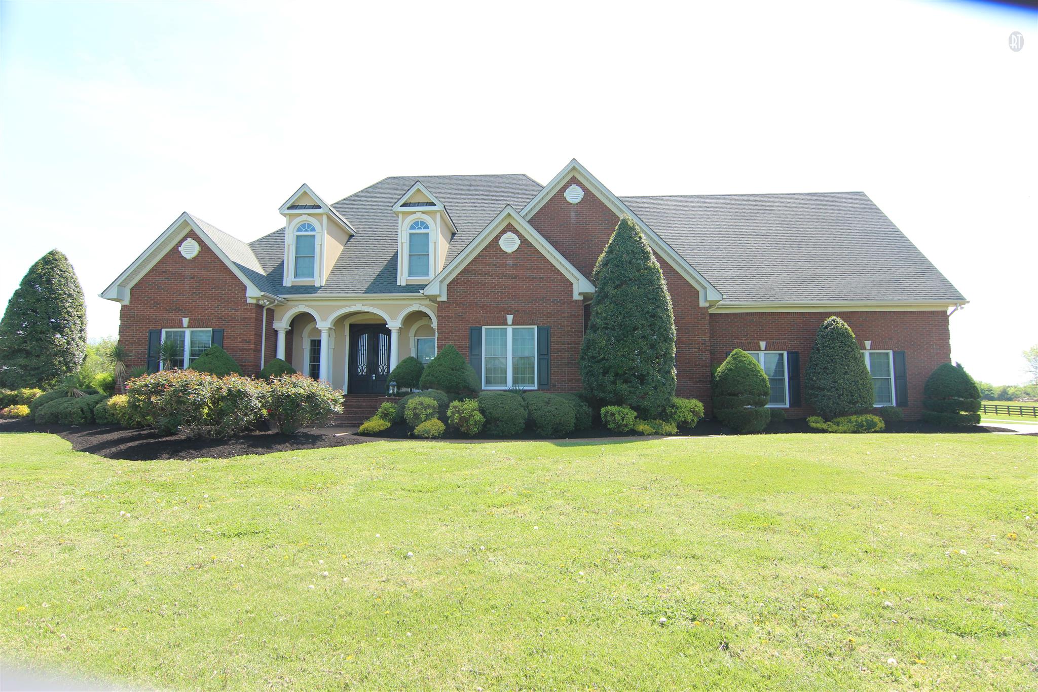 2305 Armstrong Valley Road Murfreesboro, TN 37128 - Photo 1 of 27 a front view of a house with yard and garage