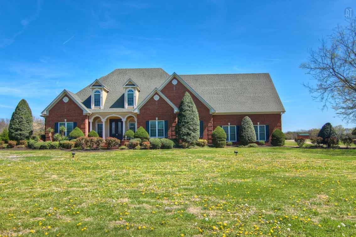 2305 Armstrong Valley Road Murfreesboro, TN 37128 - Photo 2 of 27 a front view of a house with a yard