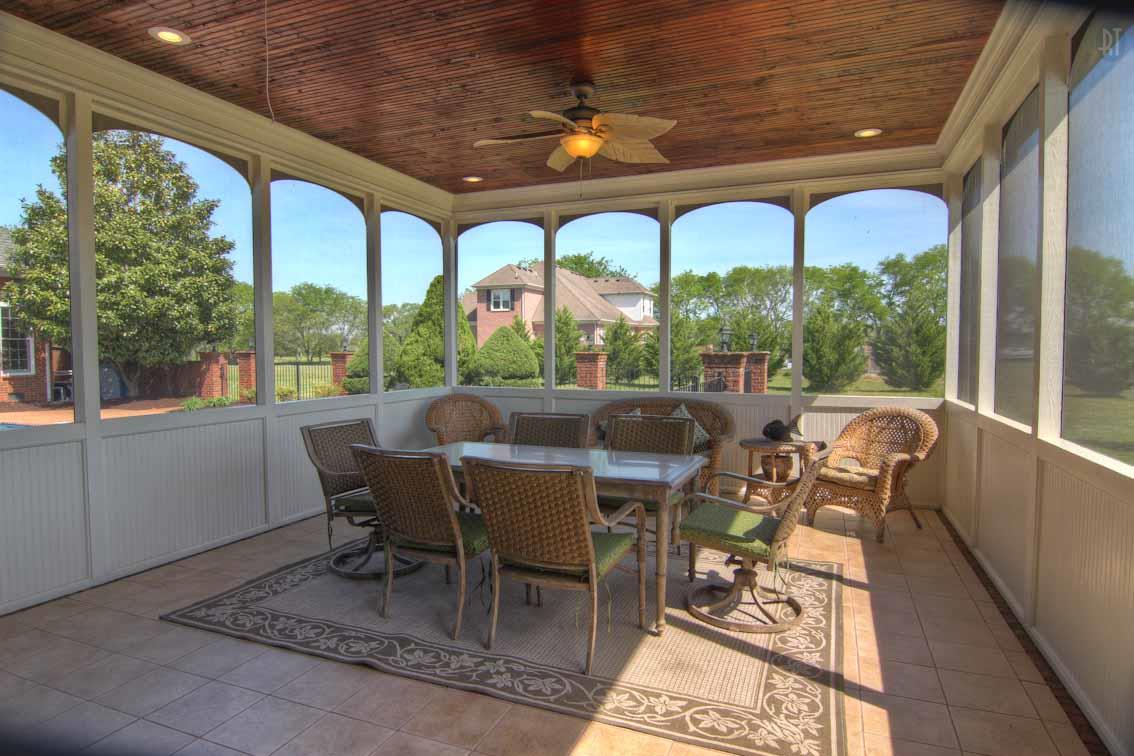 2305 Armstrong Valley Road Murfreesboro, TN 37128 - Photo 21 of 27 a view of a patio with table and chairs and floor to ceiling window