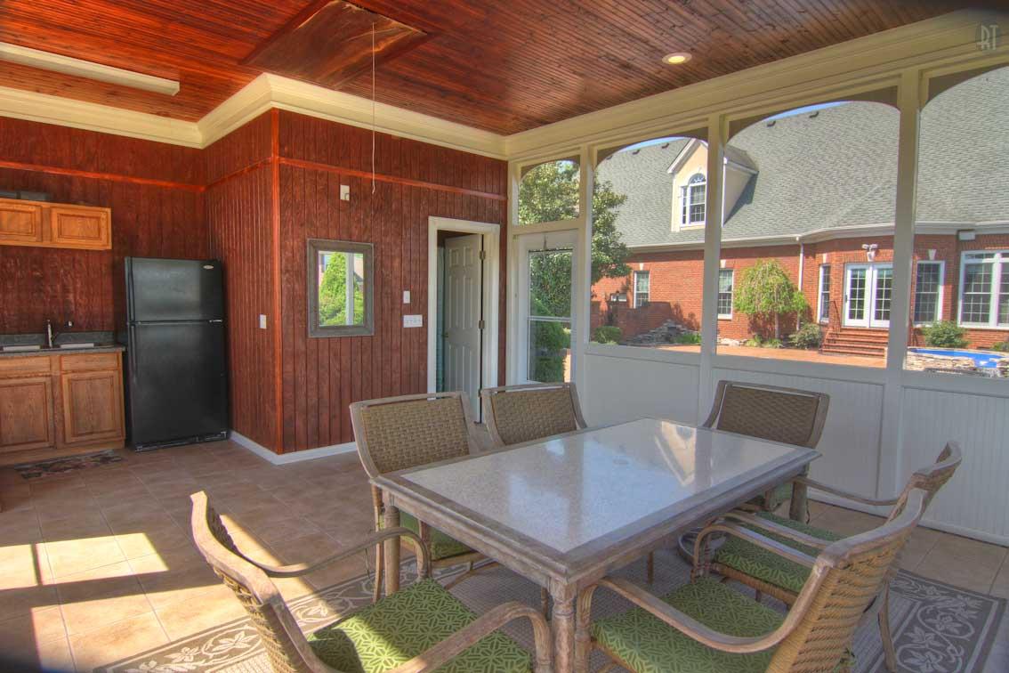 2305 Armstrong Valley Road Murfreesboro, TN 37128 - Photo 22 of 27 a view of a dining room with furniture a chandelier and wooden floor