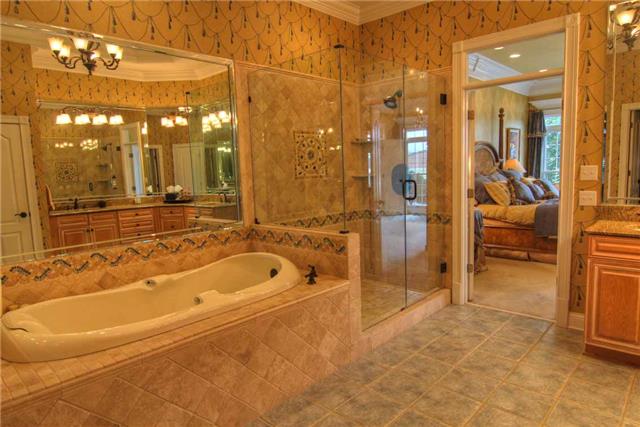 2305 Armstrong Valley Road Murfreesboro, TN 37128 - Photo 7 of 27 a bathroom with a bathtub and a shower