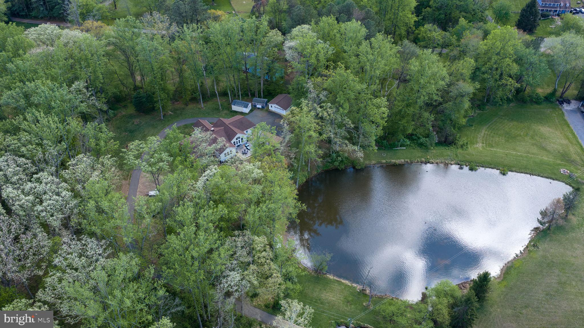 5699 Red Brick Road Warrenton, VA 20187 - Photo 3 of 35 Serene retreat by a tranquil pond.