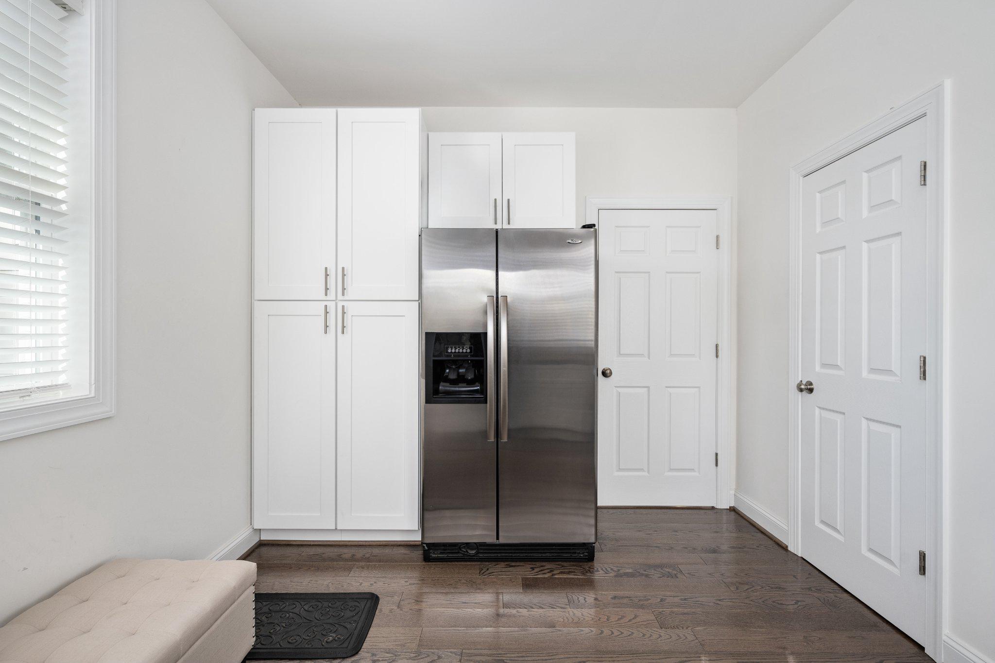 5699 Red Brick Road Warrenton, VA 20187 - Photo 31 of 35 Laundry room with xtra Frig and Half Bath