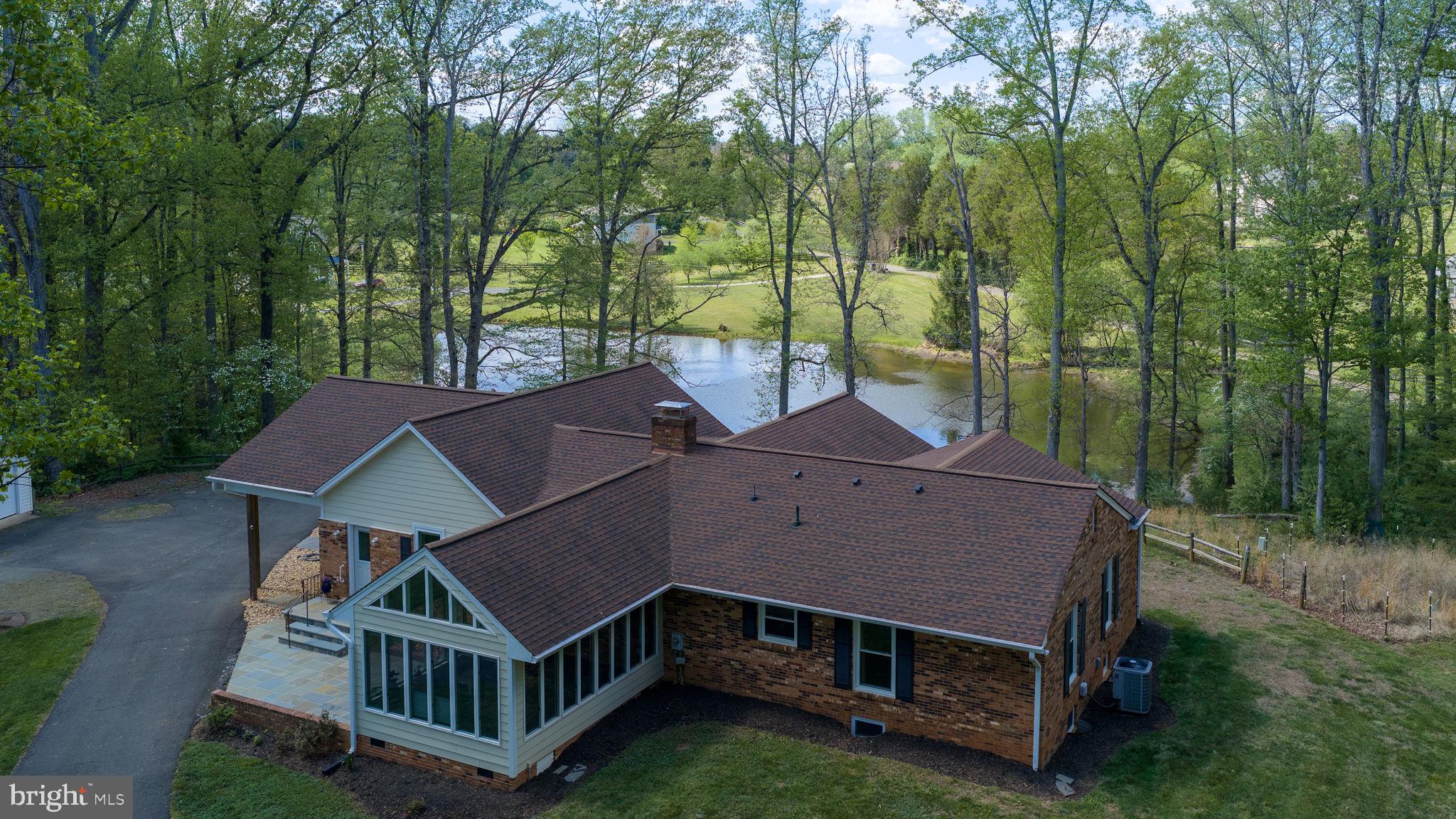 5699 Red Brick Road Warrenton, VA 20187 - Photo 35 of 35 Serene home by the tranquil pond.