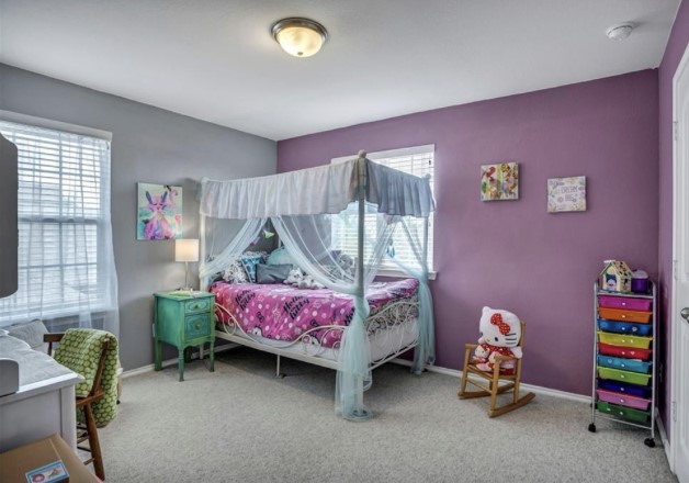 1428 Crested Butte Way Georgetown, TX 78626 - Photo 19 of 28 Bedroom with light carpet