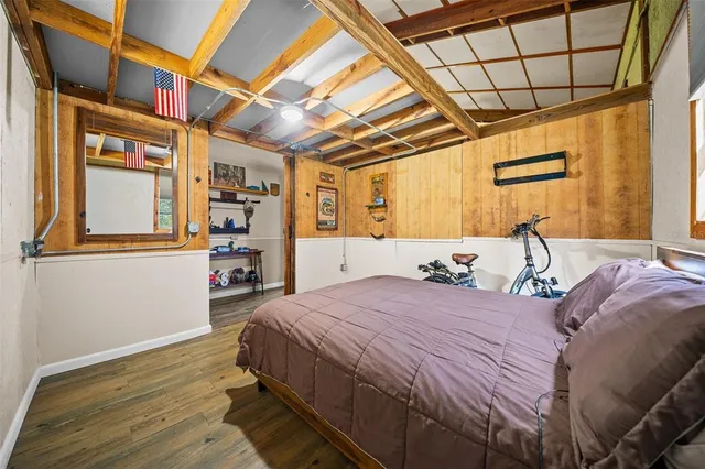 a bed room with a bed and a walk in closet