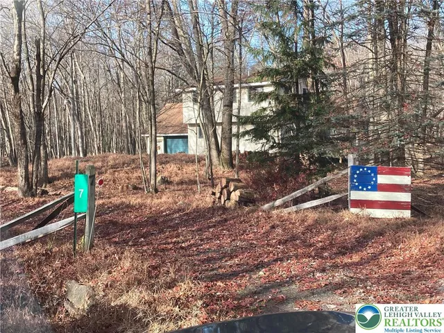 a house view with a backyard space