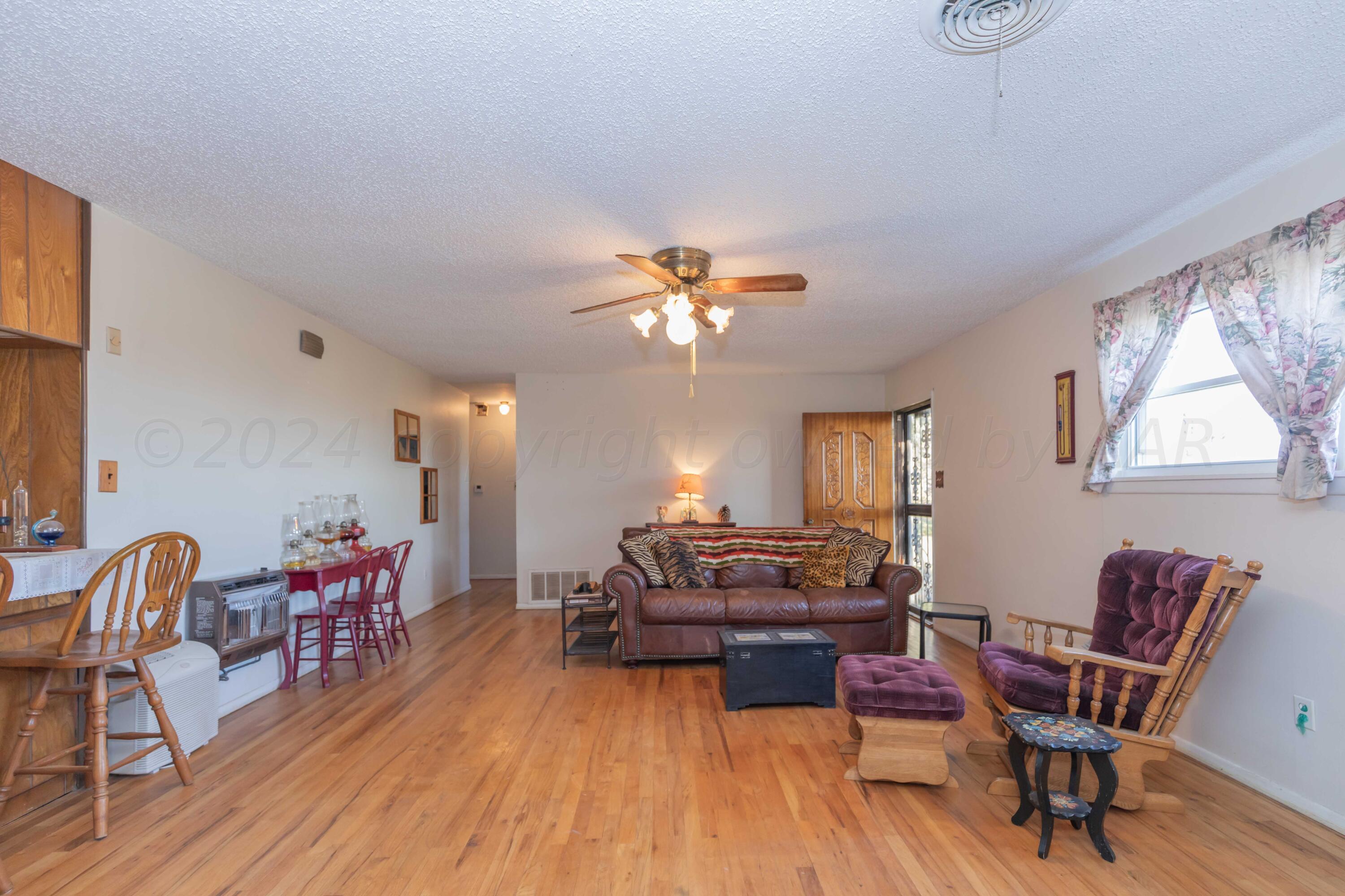 504 East Service Road Washburn, TX 79019 - Photo 4 of 54 LIVING ROOM VIEW 2
