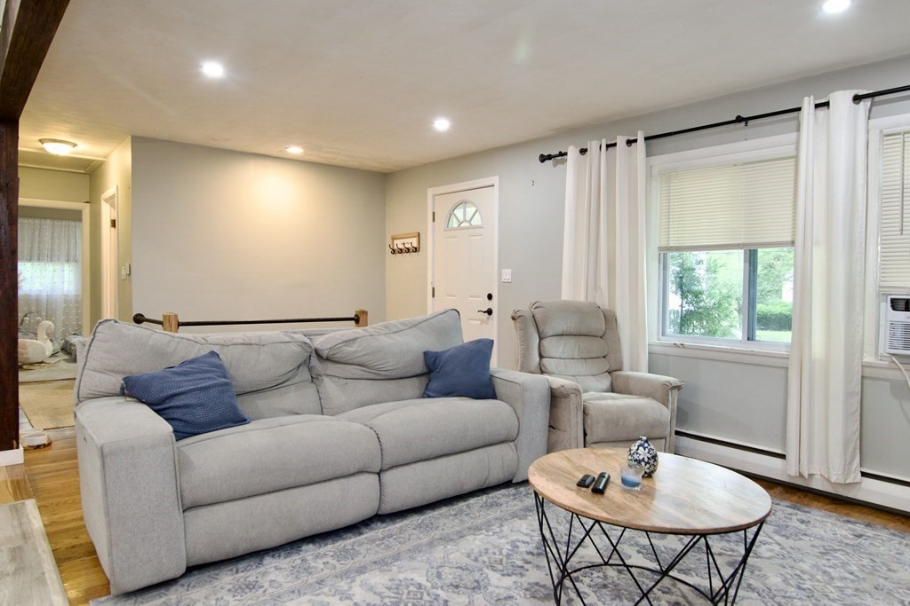 37 Greaney Street Springfield, MA 01104 - Photo 18 of 40 a living room with furniture and a large window