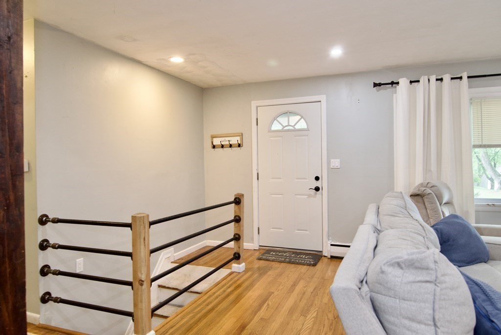 37 Greaney Street Springfield, MA 01104 - Photo 23 of 40 a view of a bedroom with furniture and window
