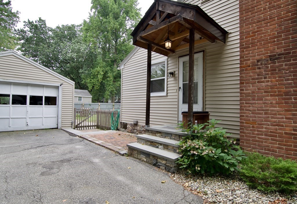 37 Greaney Street Springfield, MA 01104 - Photo 4 of 40 a view of a house with a backyard