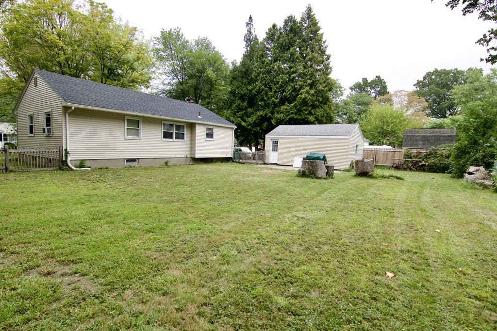 37 Greaney Street Springfield, MA 01104 - Photo 5 of 40 a house with trees in the background