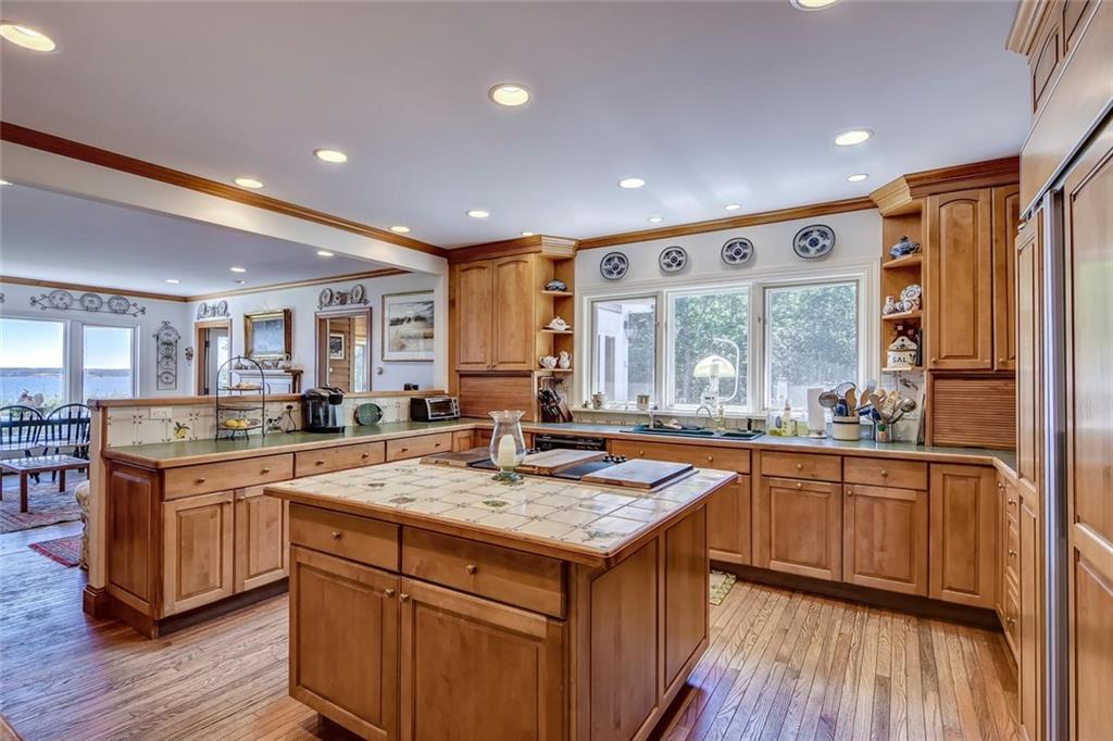 536 Reach Road Deer Isle, ME 04627 - Photo 15 of 33 Kitchen has view through to the...
