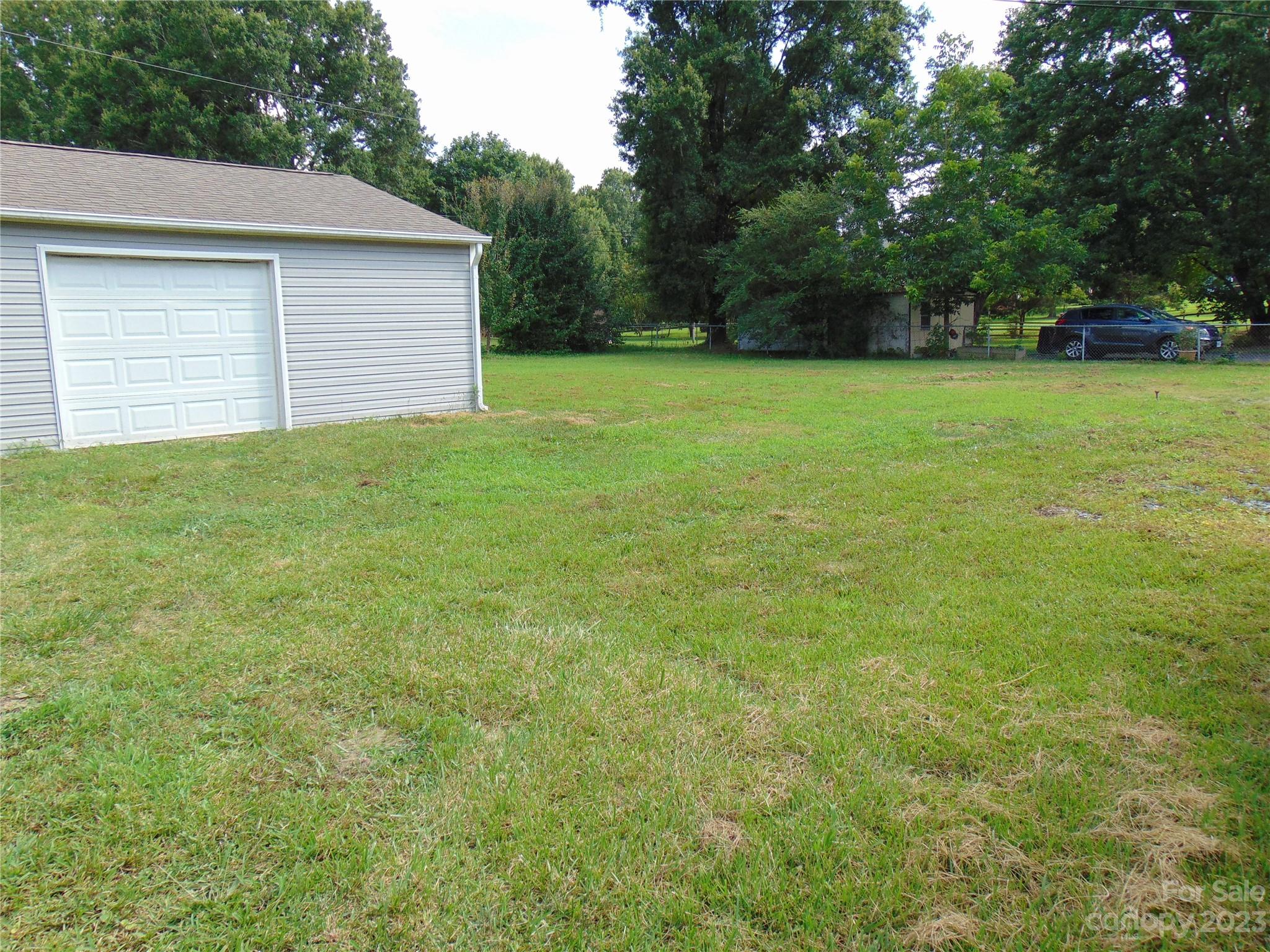 1200 Stallings Road Matthews, NC 28104 - Photo 14 of 17 a view of a backyard