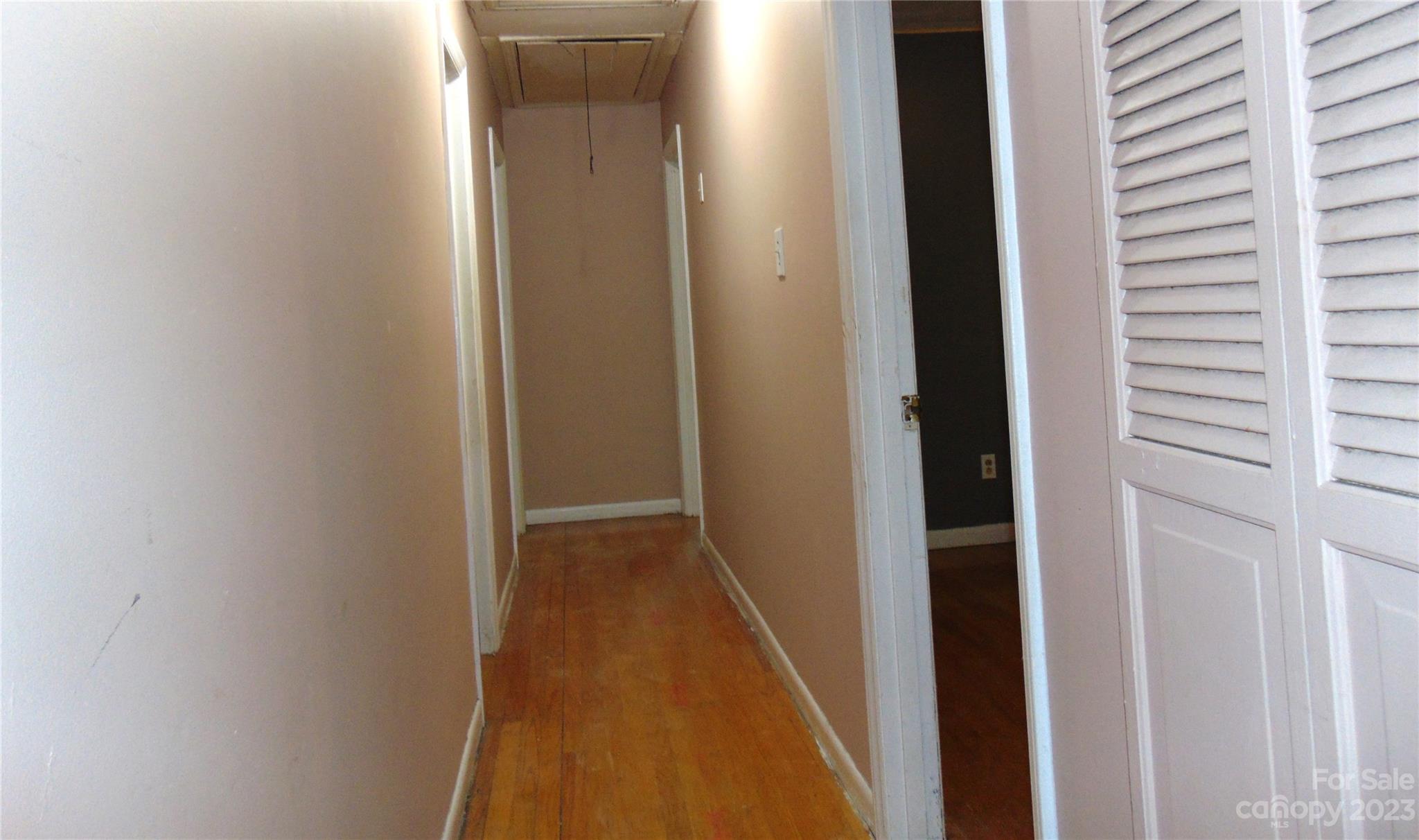 1200 Stallings Road Matthews, NC 28104 - Photo 7 of 17 a view of a hallway with a white door