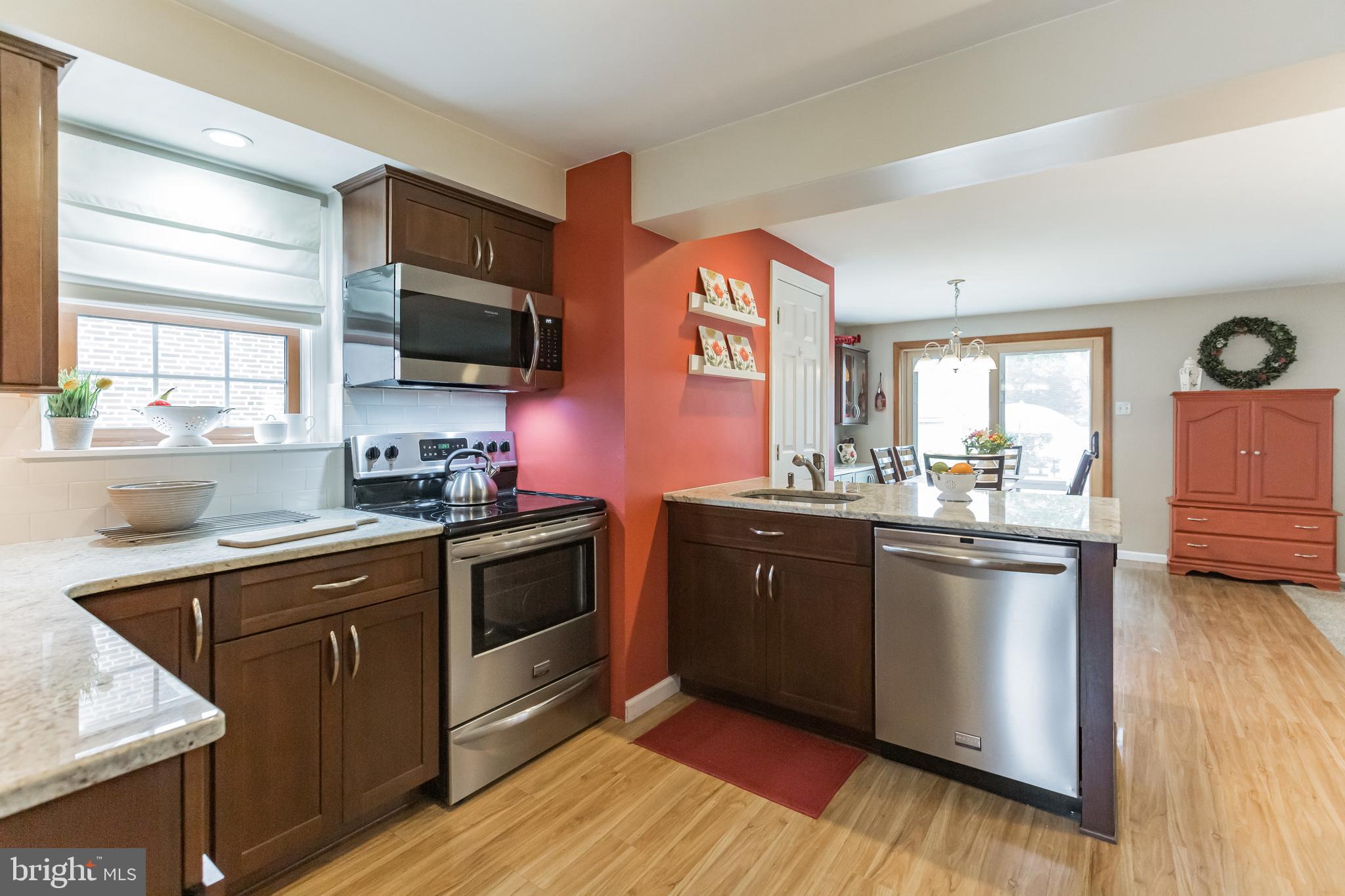 281 School Lane Springfield, PA 19064 - Photo 7 of 30 Updated kitchen w/ stainless steel appliances