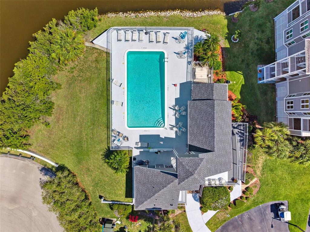 5712 Biscayne Court, Unit 103 New Port Richey, FL 34652 - Photo 25 of 31 an aerial view of a house with a garden